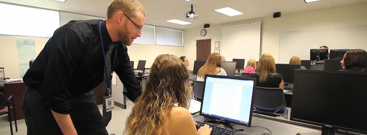 English Professor Josh Woods with student.