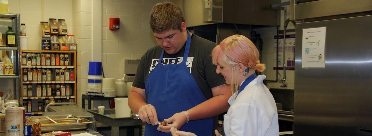 Students prepare food for upcoming event