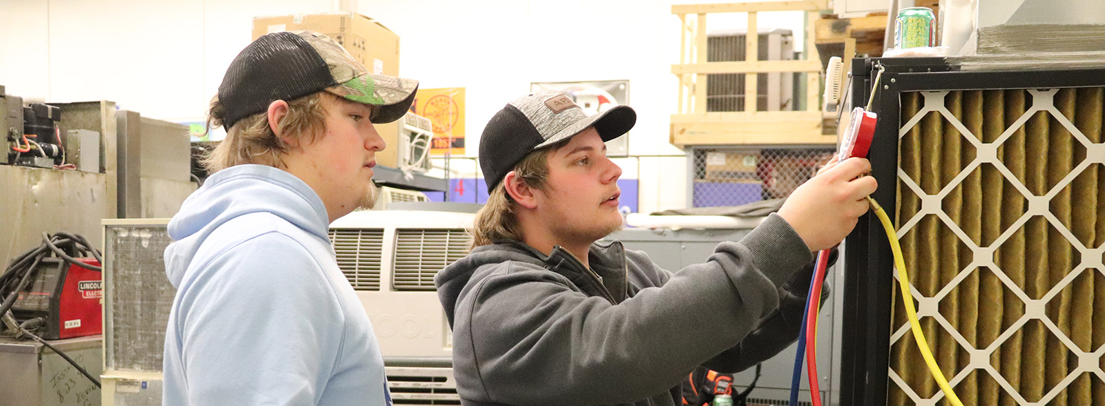 students working on HVAC