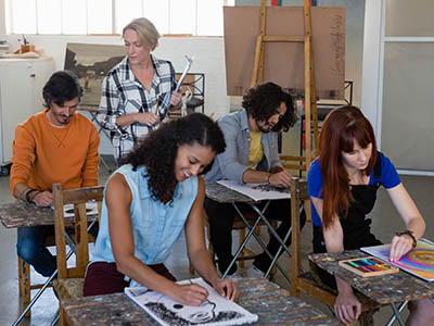 Studcents in a painting class