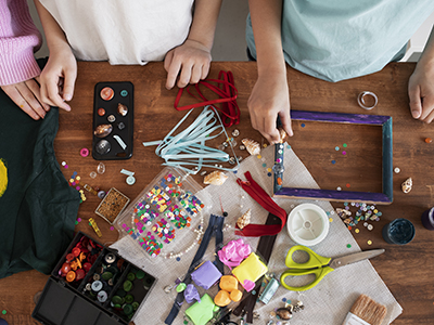 young children making DIY project