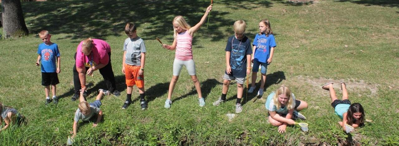 Child care kids tadpole fishing